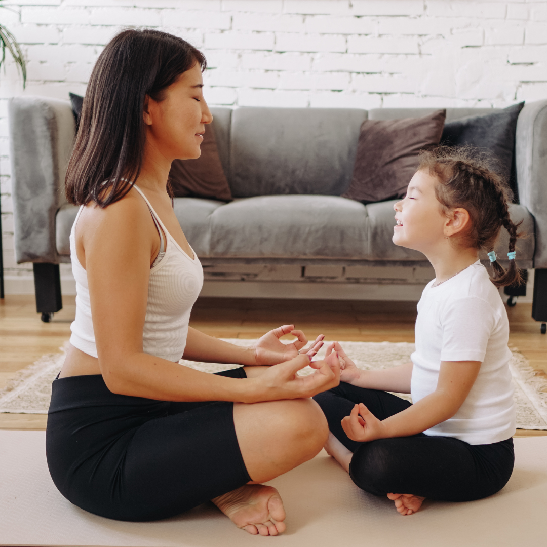 Mum and Daughter Meditating Together